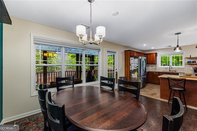 72 Griggs St SW, Marietta, GA 30064 - dining area with a chandelier, light wood-type flooring, and recessed lighting