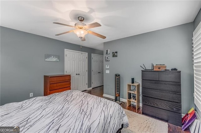 72 Griggs St SW, Marietta, GA 30064 - bedroom featuring wood finished floors, two closets, and ceiling fan