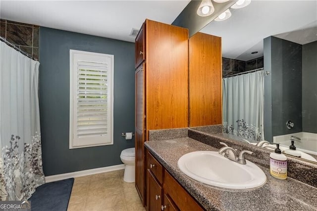 72 Griggs St SW, Marietta, GA 30064 - full bathroom featuring vanity, curtained shower, and tile patterned flooring