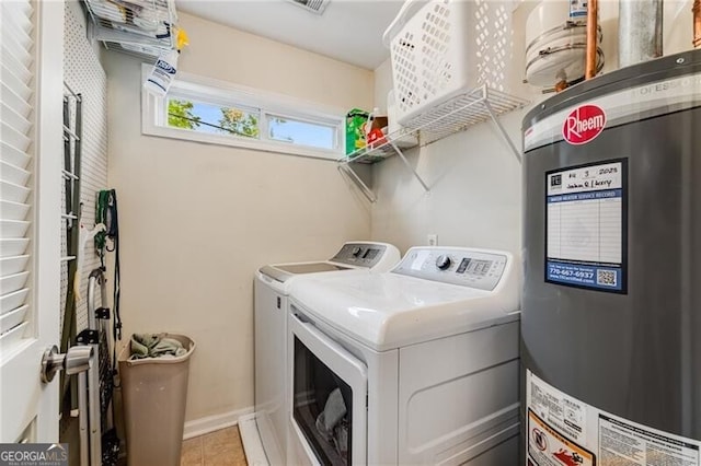 72 Griggs St SW, Marietta, GA 30064 - washroom with water heater, separate washer and dryer, and light tile patterned floors