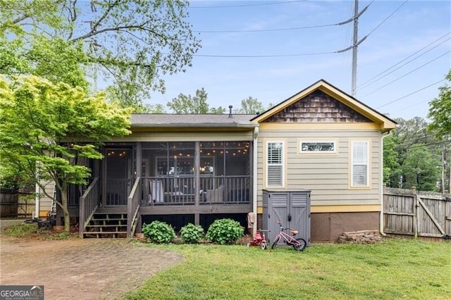 72 Griggs St SW, Marietta, GA 30064 - rear view of house with a sunroom