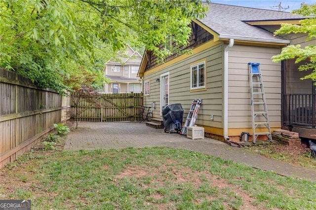 72 Griggs St SW, Marietta, GA 30064 - fenced backyard featuring a patio area