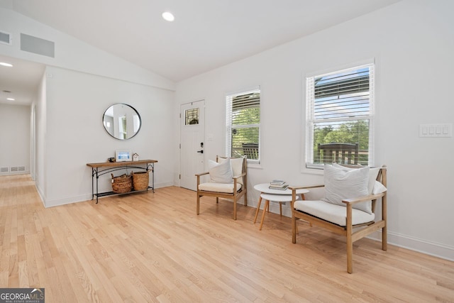 369 Arnold Mill Rd, Woodstock, GA 30188 - sitting room with visible vents, baseboards, recessed lighting, light wood-style flooring, and vaulted ceiling