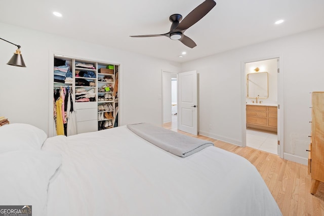 369 Arnold Mill Rd, Woodstock, GA 30188 - bedroom with a sink, ensuite bath, recessed lighting, a ceiling fan, and wood finished floors