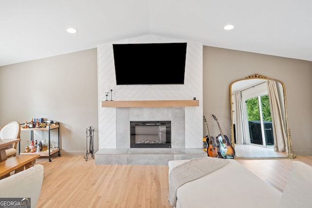 369 Arnold Mill Rd, Woodstock, GA 30188 - bedroom with baseboards, recessed lighting, wood finished floors, and a large fireplace