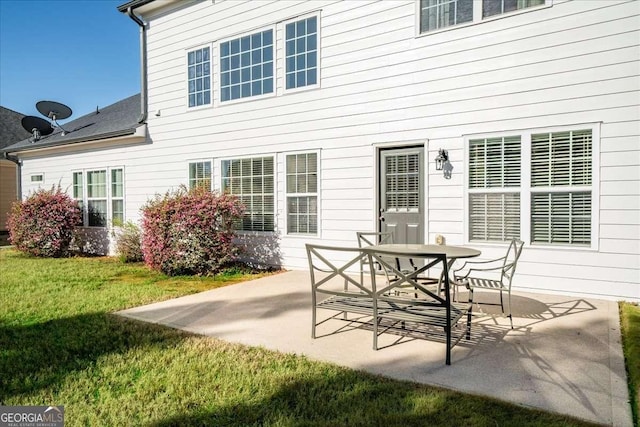 3125 Crooked Stick Dr, Cumming, GA 30041 - rear view of property featuring a lawn and a patio