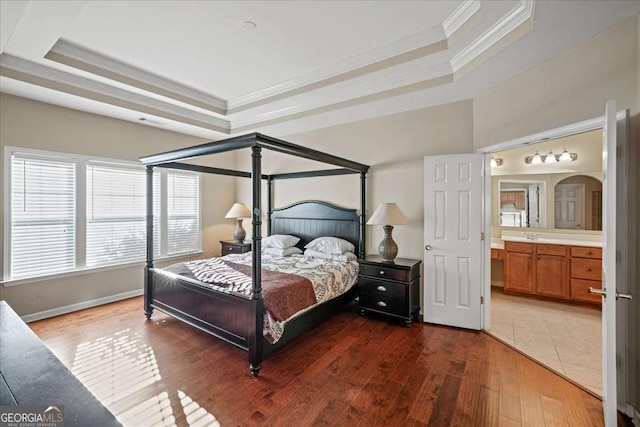 3125 Crooked Stick Dr, Cumming, GA 30041 - bedroom with a tray ceiling, hardwood / wood-style floors, crown molding, and baseboards