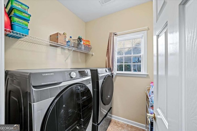 3125 Crooked Stick Dr, Cumming, GA 30041 - washroom featuring washing machine and clothes dryer, visible vents, laundry area, and baseboards