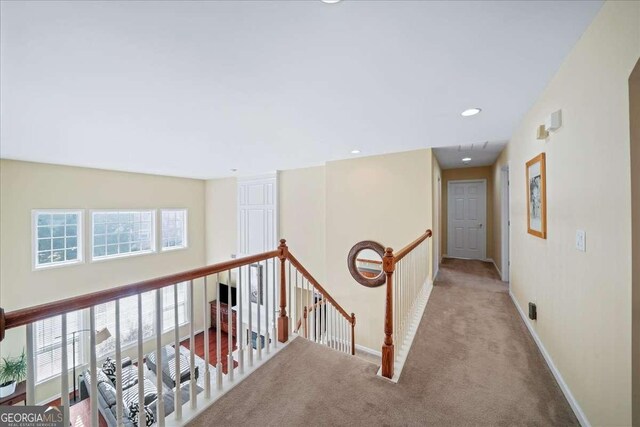 3125 Crooked Stick Dr, Cumming, GA 30041 - hall featuring baseboards, carpet flooring, an upstairs landing, and plenty of natural light