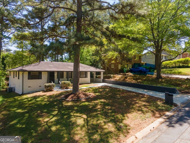 2704 Terratim Ln, Decatur, GA 30034 - single story home with asphalt driveway, a front yard, and central air condition unit