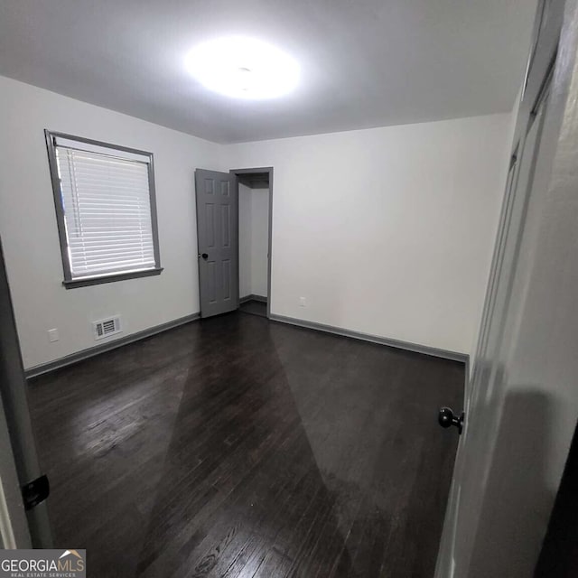 2704 Terratim Ln, Decatur, GA 30034 - spare room featuring dark wood finished floors and baseboards