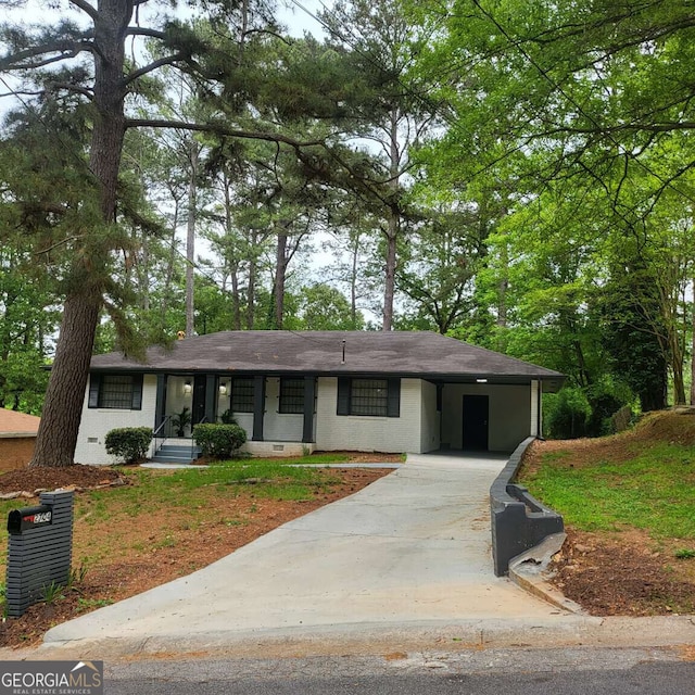 2704 Terratim Ln, Decatur, GA 30034 - ranch-style house featuring driveway, an attached carport, and roof with shingles