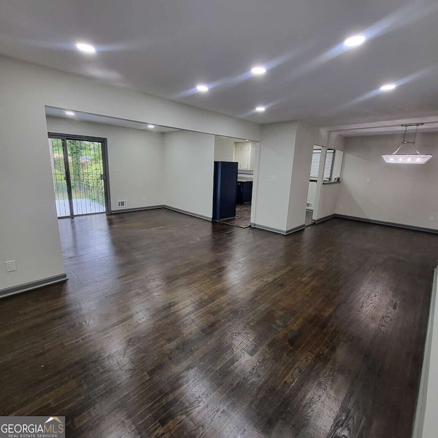 2704 Terratim Ln, Decatur, GA 30034 - unfurnished living room featuring dark wood-type flooring, recessed lighting, and baseboards
