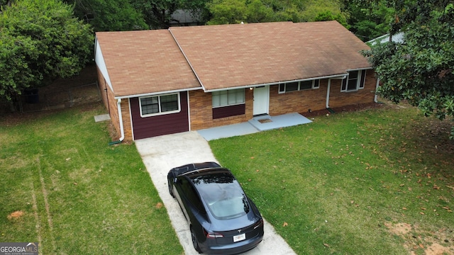 7336 Howard Cir, Jonesboro, GA 30236 - ranch-style house with a front lawn