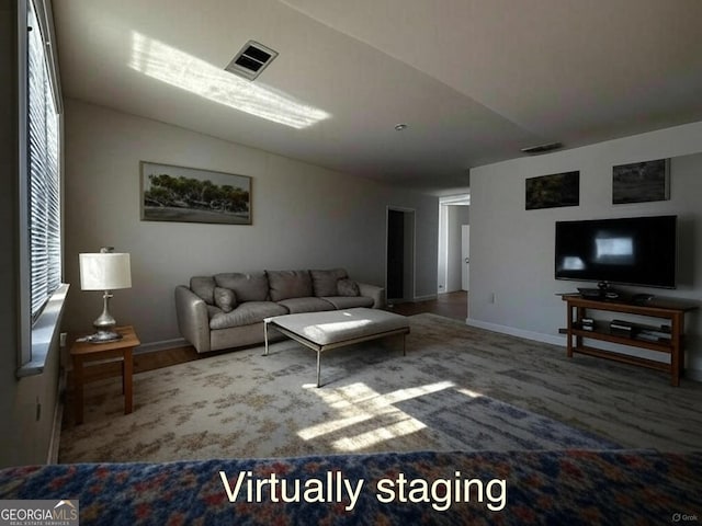 7336 Howard Cir, Jonesboro, GA 30236 - living room with baseboards and visible vents