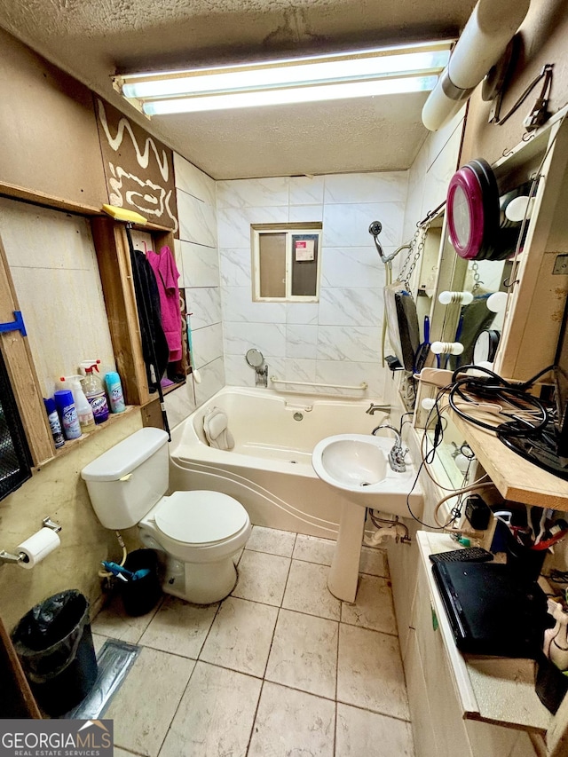 165 Vine St, Athens, GA 30601 - full bathroom featuring a textured ceiling, tile patterned flooring, and  shower combination