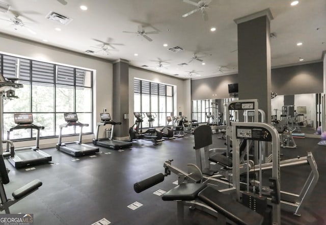 exercise room with crown molding, visible vents, and recessed lighting