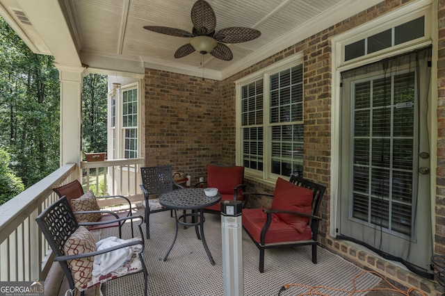 exterior space with a ceiling fan