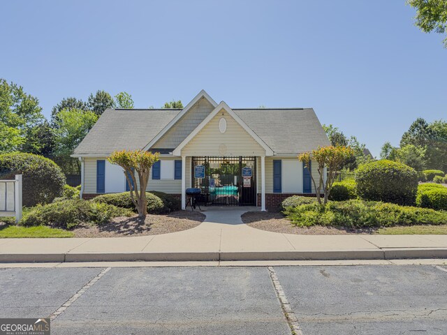 view of property featuring fence