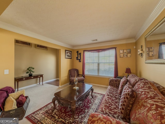 living area featuring visible vents, carpet, a textured ceiling, and ornamental molding