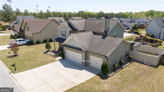 411 Conductor Ct, Jefferson, GA 30549 - rear view of house with a lawn, a fenced backyard, a chimney, and a gate