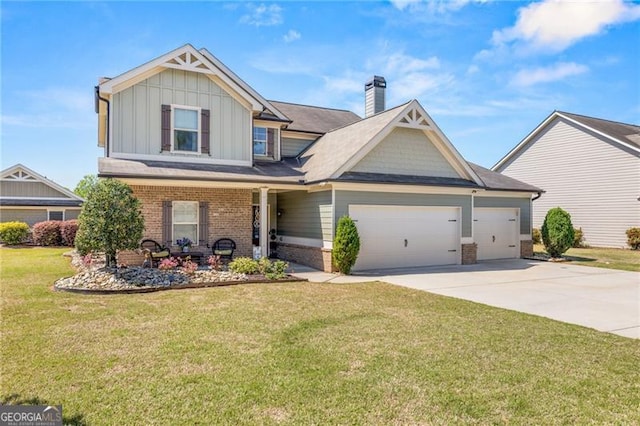 411 Conductor Ct, Jefferson, GA 30549 - view of front of house with brick siding, board and batten siding, concrete driveway, and a garage