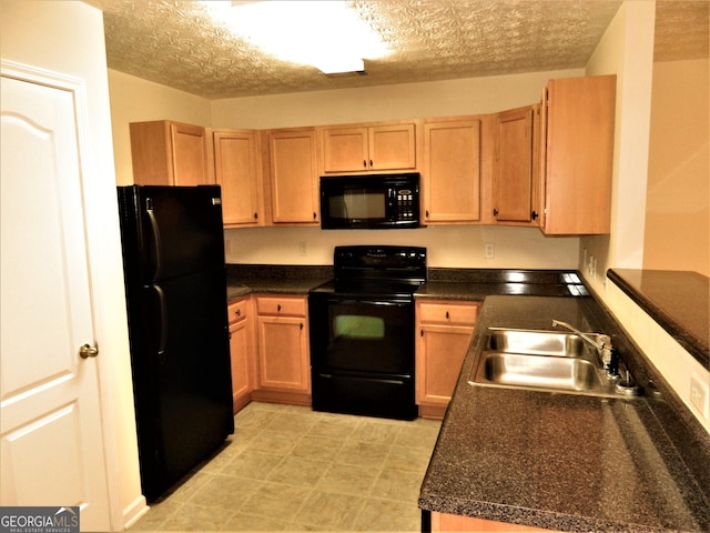 615 Magnolia Gardens Walk, Mcdonough, GA 30253 - kitchen featuring dark countertops, a sink, a textured ceiling, and black appliances