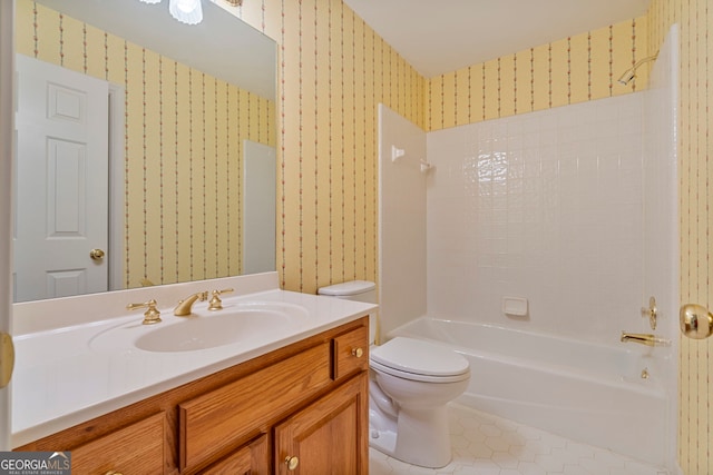 full bathroom featuring vanity, tile patterned flooring, toilet, and wallpapered walls