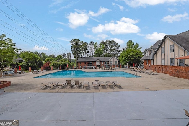 6851 Roswell Rd Unit C7, Atlanta, GA 30328 - community pool featuring a patio