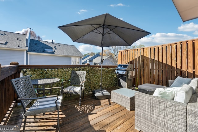 1236 Brickton Dr NW, Atlanta, GA 30318 - wooden terrace with a grill and outdoor lounge area