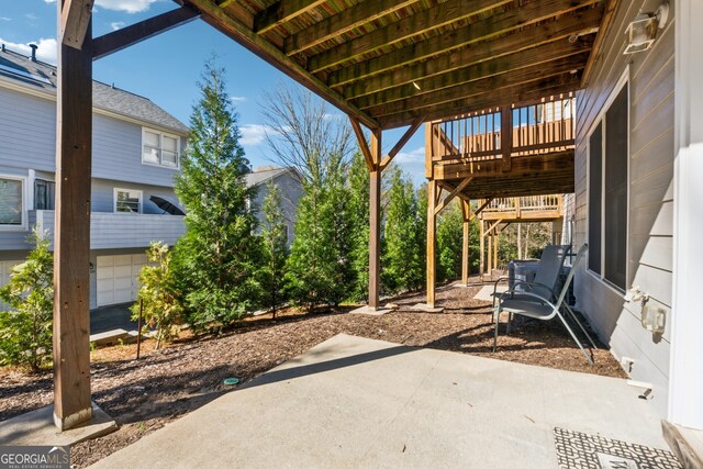1236 Brickton Dr NW, Atlanta, GA 30318 - view of patio / terrace with a wooden deck