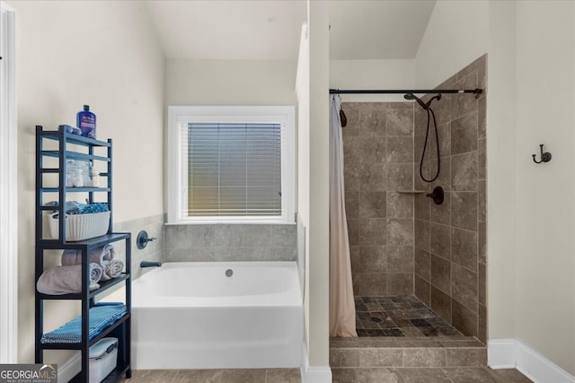 5950 Hidden Ridge Ct, Cumming, GA 30028 - bathroom featuring a garden tub and a tile shower