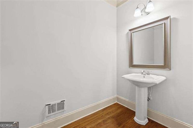 51 Sagemont Ct, Acworth, GA 30101 - bathroom with baseboards, wood finished floors, and visible vents