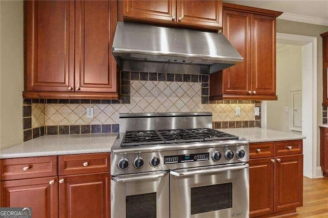 51 Sagemont Ct, Acworth, GA 30101 - kitchen featuring under cabinet range hood, light countertops, ornamental molding, double oven range, and tasteful backsplash