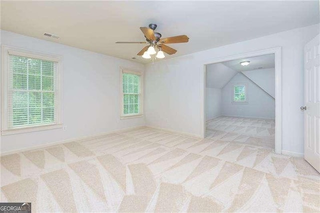 51 Sagemont Ct, Acworth, GA 30101 - additional living space with vaulted ceiling, baseboards, visible vents, carpet, and a ceiling fan