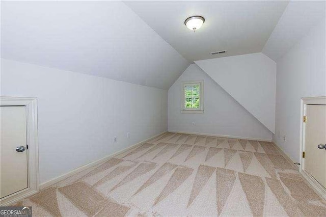 51 Sagemont Ct, Acworth, GA 30101 - additional living space with lofted ceiling, visible vents, and carpet