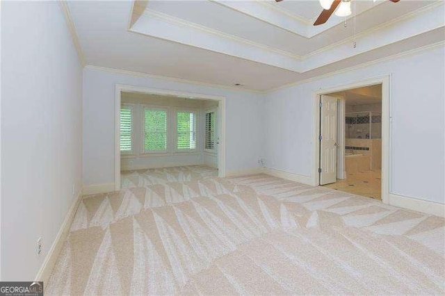 51 Sagemont Ct, Acworth, GA 30101 - carpeted empty room with a ceiling fan, baseboards, ornamental molding, and a tray ceiling