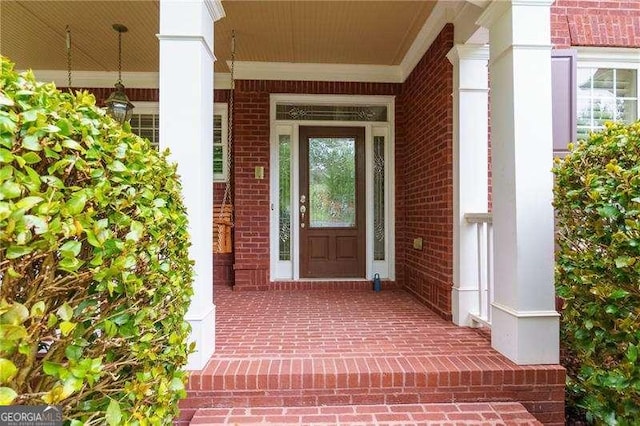 51 Sagemont Ct, Acworth, GA 30101 - view of exterior entry featuring brick siding and covered porch