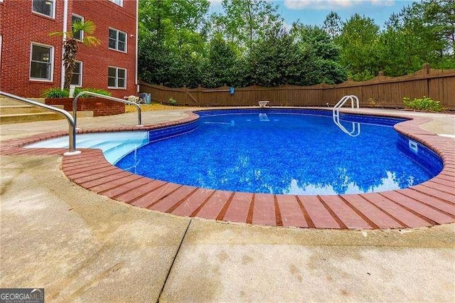51 Sagemont Ct, Acworth, GA 30101 - view of swimming pool featuring a fenced in pool, a patio, and a fenced backyard