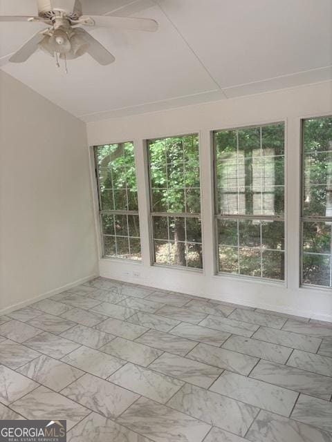 unfurnished sunroom featuring an inviting chandelier