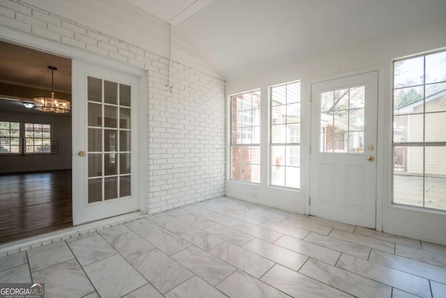 unfurnished living room with baseboards, a ceiling fan, wood finished floors, and ornamental molding
