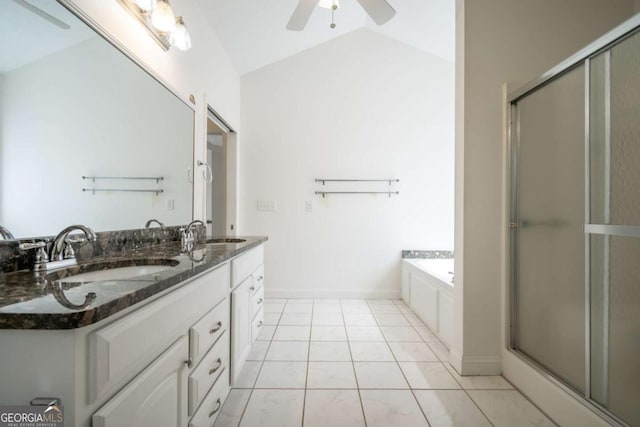 bathroom with a shower stall, vaulted ceiling, a ceiling fan, and a sink