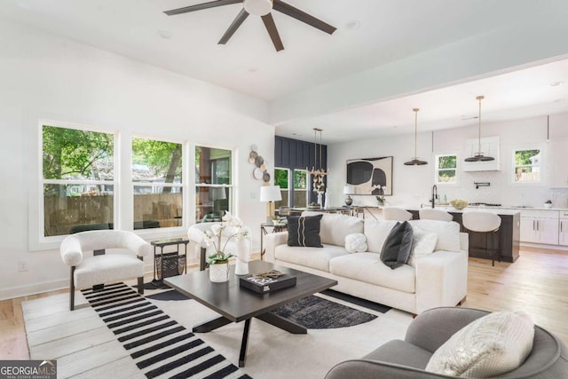 156 Martha Ave NE, Atlanta, GA 30317 - living area with light wood finished floors and a ceiling fan