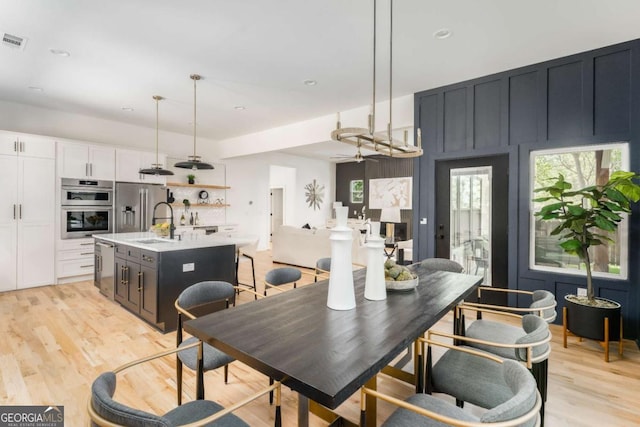 156 Martha Ave NE, Atlanta, GA 30317 - dining space featuring light wood finished floors, ceiling fan, and recessed lighting
