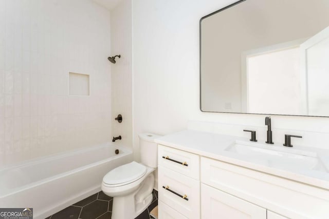 156 Martha Ave NE, Atlanta, GA 30317 - bathroom featuring toilet, vanity, tub / shower combination, and tile patterned flooring