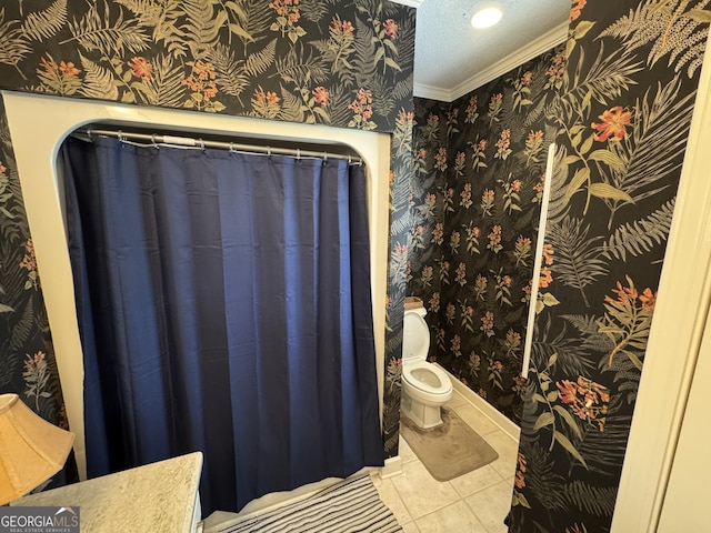 1323 Fairway Dr, Elberton, GA 30635 - bathroom with tile patterned floors, a textured ceiling, toilet, wallpapered walls, and crown molding