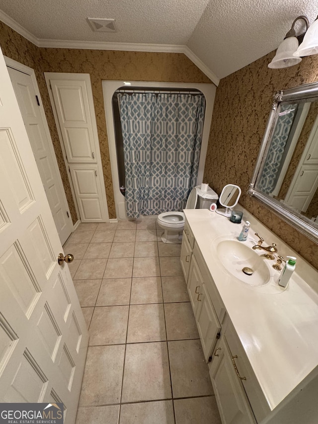 1323 Fairway Dr, Elberton, GA 30635 - bathroom featuring a textured ceiling, visible vents, wallpapered walls, vaulted ceiling, and tile patterned flooring