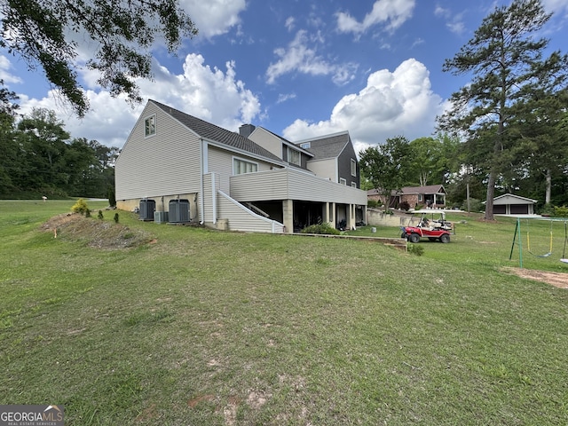 1323 Fairway Dr, Elberton, GA 30635 - rear view of house featuring central AC unit and a yard