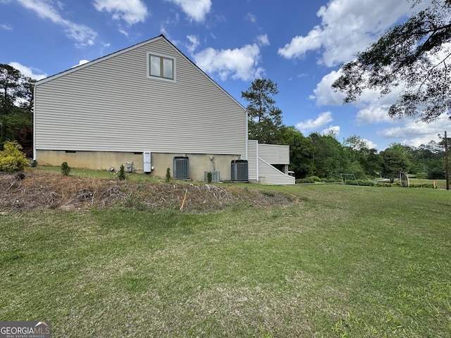 1323 Fairway Dr, Elberton, GA 30635 - view of property exterior with crawl space, a yard, and central air condition unit