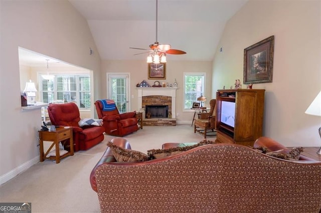 152 Cooper Creek Dr, Dallas, GA 30157 - living room featuring vaulted ceiling, a ceiling fan, a fireplace, baseboards, and carpet flooring